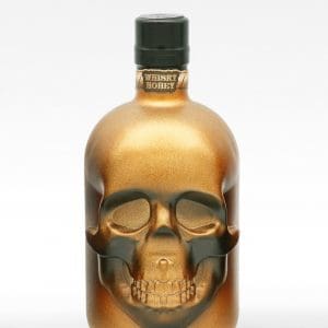 goldene Totenkopfflasche mit Stüürmanns Seemannstod Whisky Likör mit Honig-Whisky-Likör, Vorderseite mit Totenkopfgesicht